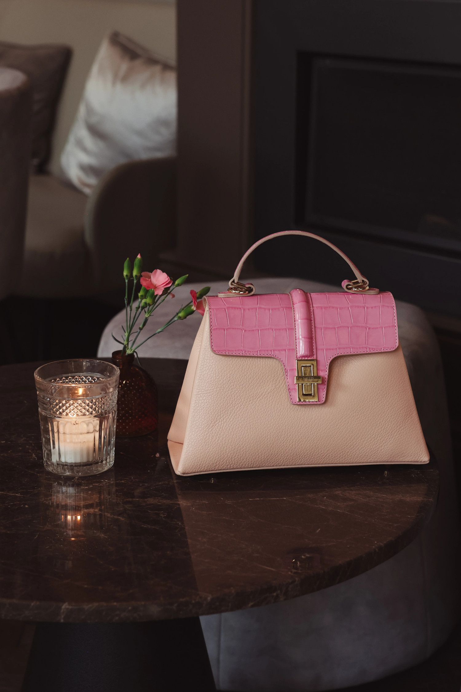 The Monaco, Dubai edition, on a marble table by candlelight